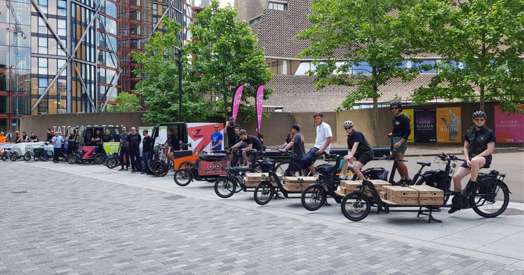 Cargo bike couriers parked outside the Tate Modern, London