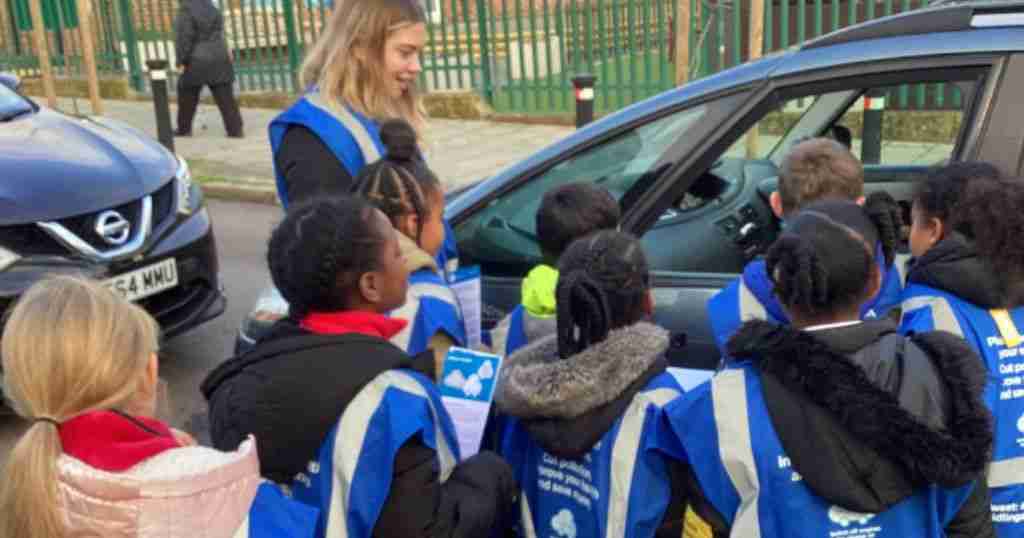 School children participating in an anti-idling workshop.