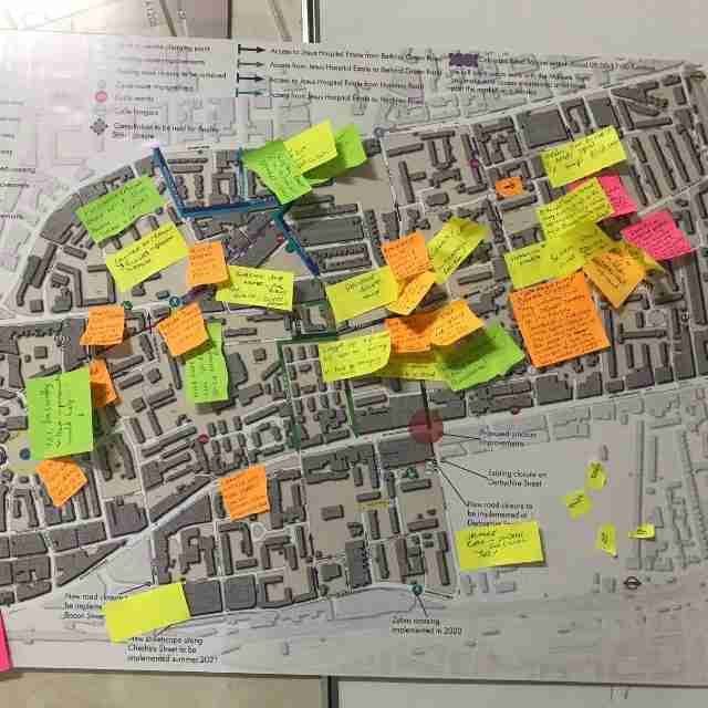 A map with sticky notes filled with ideas